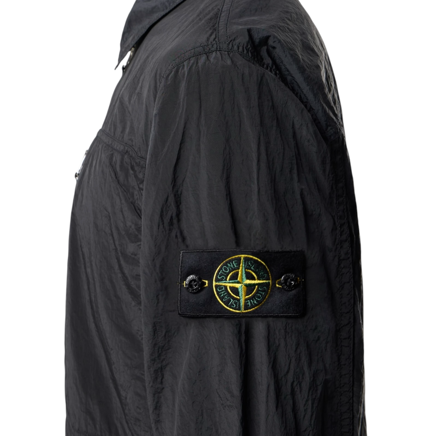 Urban Saints black Stone Island lightweight crinkled zip-up overshirt with iconic compass sleeve patch.