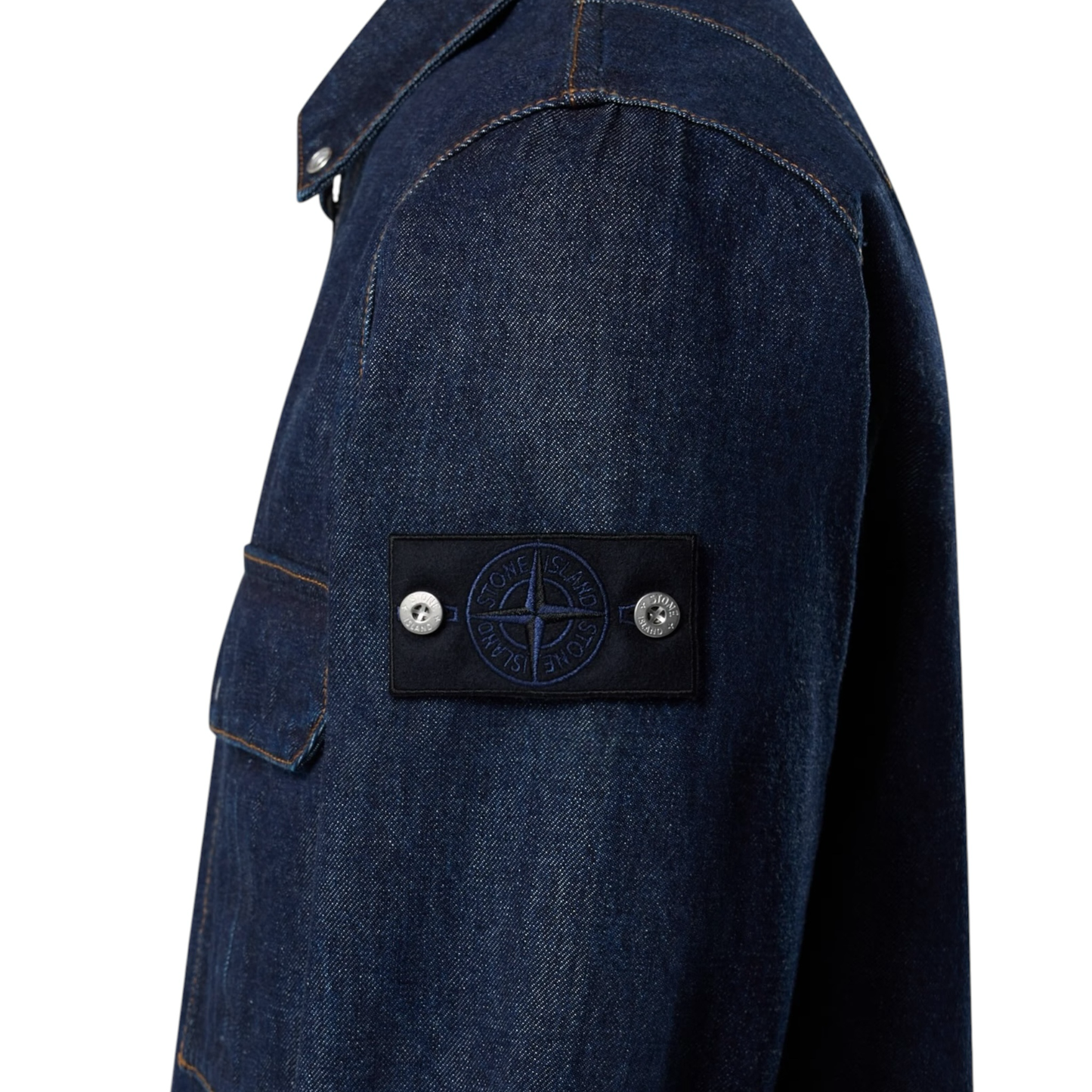 Urban Saints Stone Island indigo denim zip-up jacket featuring the iconic sleeve badge and chest pocket detail.