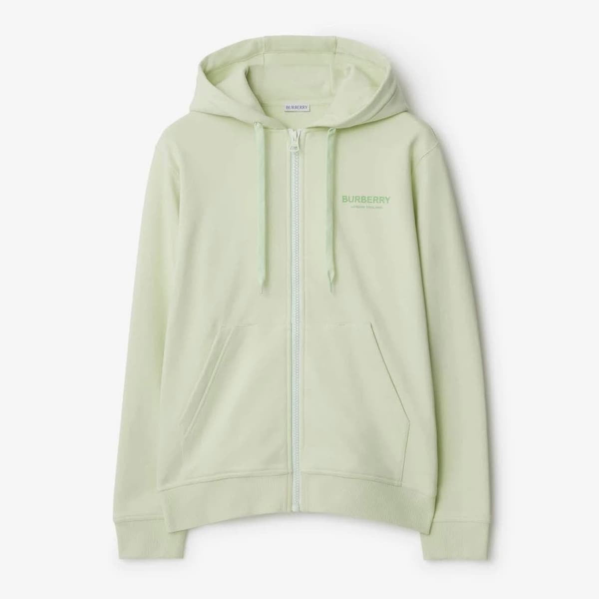 Urban Saints sage green Burberry cotton zip-up hoodie with drawstring hood, front pockets, and embroidered logo.