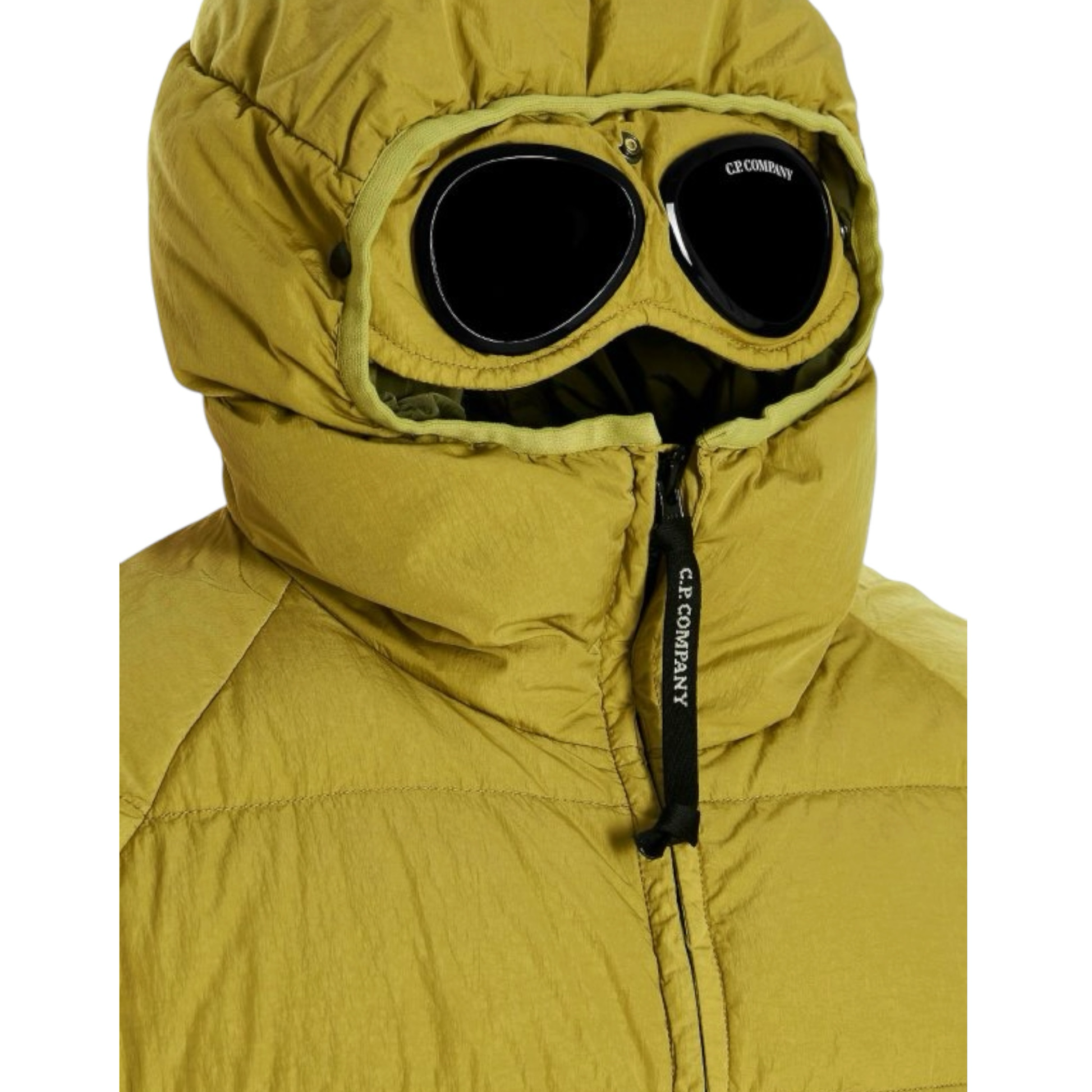 Urban Saints olive-yellow C.P. Company puffer jacket with signature goggle-lens hood and full-length zip closure.