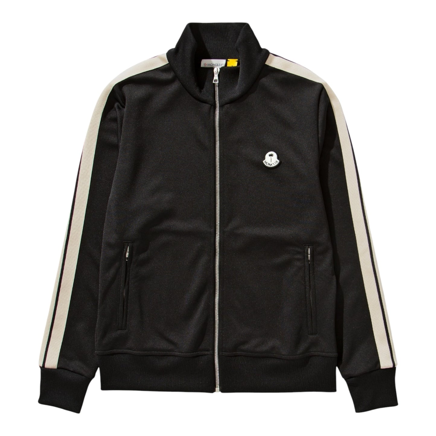 Urban Saints Moncler Palm Angels black technical zip-up track jacket with cream sleeve stripes and logo chest patch.