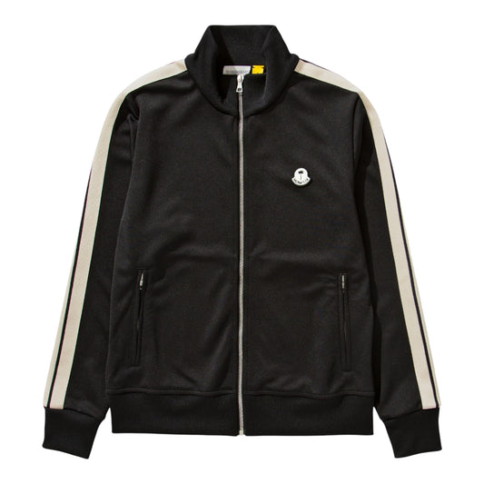 Urban Saints Moncler Palm Angels black technical zip-up track jacket with cream sleeve stripes and logo chest patch.