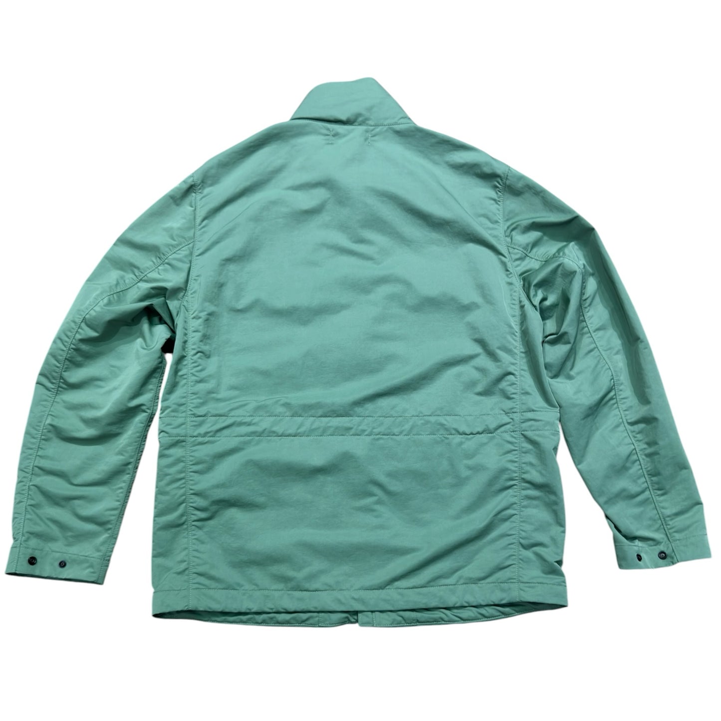 Back view of a sage green Urban Saints field jacket with a high collar and structured silhouette.