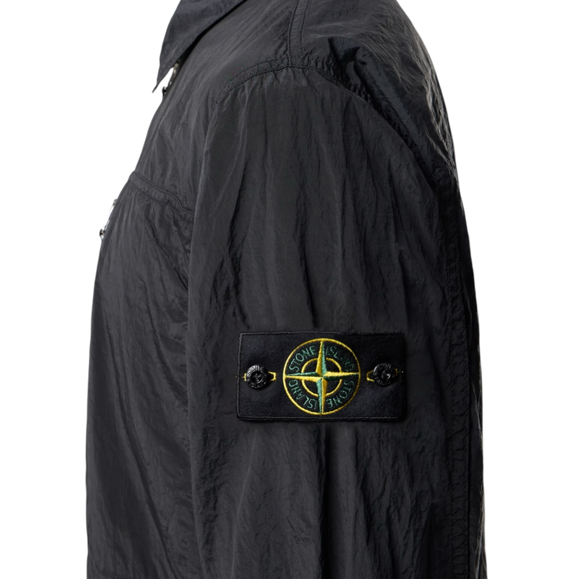 Urban Saints black Stone Island lightweight crinkled zip-up overshirt with iconic compass sleeve patch.