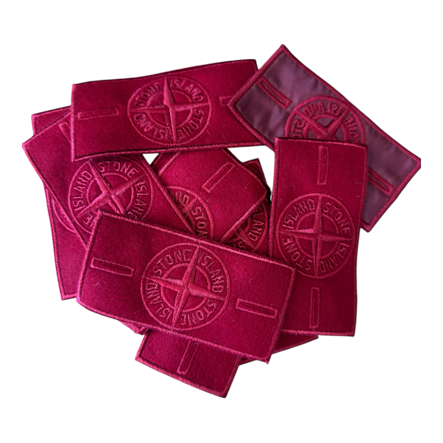 Urban Saints Stone Island embroidered red compass logo patches. Felt with satin backing.